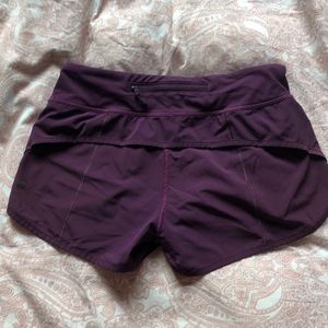 Lululemon speed short, 2.5 in inseam, dark purple.
